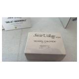 Department 56 Snow kids around the tree, figurines and snowmobile