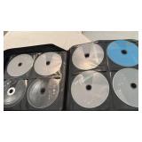 Case of DVDs approx 200 including Harry Potter, James Bond and more