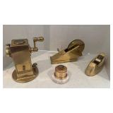 Vintage brass pencil sharpener, tape dispensers and stamp postage holder