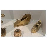 Vintage brass pencil sharpener, tape dispensers and stamp postage holder