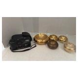 Brass ashtrays and Lexxus camera
