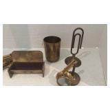 Brass stapler, magnifying glass stand and more