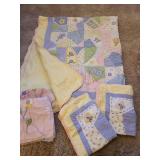 Full/Queen pastel bedspread with 2 pillow shams and a bed skirt.