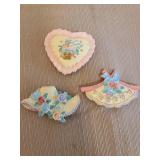 Vintage hankies, crocheted potholders, tea towels and refrigerator magnets