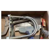 U bolts, clamps, hand sander and putty blade