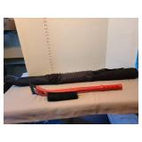 Windshield cover in bag and ice scraper with brush.