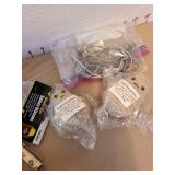 Calculators, doorknob, small levels, measuring tapes, magnifying glass, more