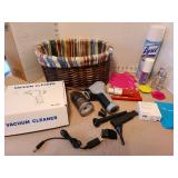 Mini hand vacuum, lined basket, toiletries