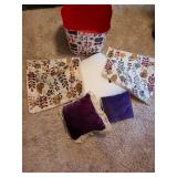 Throw pillows with shams and tub.