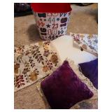 Throw pillows with shams and tub.