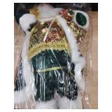 Santa Claus decoration for Christmas with green cloak Santa Claus decoration for Christmas with green cloak