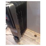 1500-Watt Black Indoor Electric Oil-Filled Radiator Convection Radiant Space Heater with Remote Control for Living Space - Retail: $100 1500-Watt Black Indoor Electric Oil-Filled Radiator Convection Radiant Space Heater with Remote Control for Living Space - Retail: $100