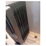 1500-Watt Black Indoor Electric Oil-Filled Radiator Convection Radiant Space Heater with Remote Control for Living Space - Retail: $100 1500-Watt Black Indoor Electric Oil-Filled Radiator Convection Radiant Space Heater with Remote Control for Living Space - Retail: $100