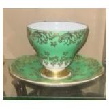This is an Aynsley bone china teacup and saucer