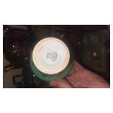 This is an Aynsley bone china teacup and saucer