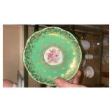 This is an Aynsley bone china teacup and saucer