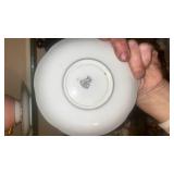 This is an Aynsley bone china teacup and saucer