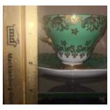 This is an Aynsley bone china teacup and saucer