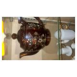 The image features a vintage trio of Japanese brown-glazed Moriage teapots.