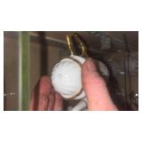 This is a Formalities by Baum Bros miniature white with gold trim tea set, made of bone china.