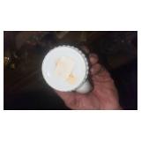 This is a Formalities by Baum Bros miniature white with gold trim tea set, made of bone china.