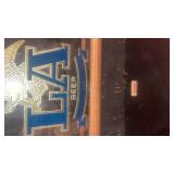 This is a vintage 1985 Anheuser-Busch LA Beer advertising mirror with a chalkboard.