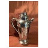 vintage Art Deco-style chrome cocktail shaker.