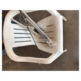 Wind Chimes & Plastic Patio Chair  -- Gar