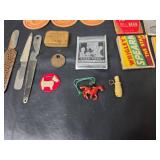 Mid-Century Advertising Matchbooks, Ties Clips, Milk Bottle Tops, Eye Glasses, and Cracker Jack Toys