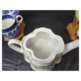 Teapot with Daisy Pattern, 2 Cups with Saucers, and 2 Wooden Stands