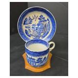 Teapot with Daisy Pattern, 2 Cups with Saucers, and 2 Wooden Stands