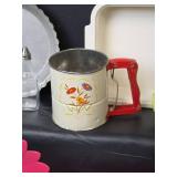 Kitchen Collection with Floral Flour Sifter, Pie Plate, Cake Pans, Hot Plates, and More