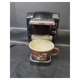 Keurig B31 Single Serve Coffee Maker and Large Coffee Mug Powers On