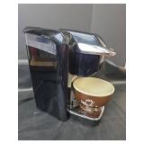 Keurig B31 Single Serve Coffee Maker and Large Coffee Mug Powers On