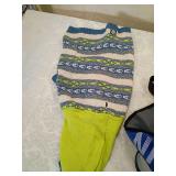 Dog lot including cone, sweater, and harnesses.