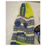 Dog lot including cone, sweater, and harnesses.