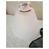 Dog lot including cone, sweater, and harnesses.