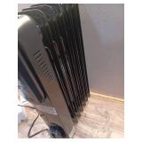 1500-Watt Black Indoor Electric Oil-Filled Radiator Convection Radiant Space Heater with Remote Control for Living Space - Retail: $100