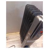 1500-Watt Black Indoor Electric Oil-Filled Radiator Convection Radiant Space Heater with Remote Control for Living Space - Retail: $100