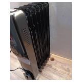 1500-Watt Black Indoor Electric Oil-Filled Radiator Convection Radiant Space Heater with Remote Control for Living Space - Retail: $100