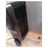1500-Watt Black Indoor Electric Oil-Filled Radiator Convection Radiant Space Heater with Remote Control for Living Space - Retail: $100