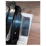 1500-Watt Black Indoor Electric Oil-Filled Radiator Convection Radiant Space Heater with Remote Control for Living Space - Retail: $100