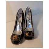 The Buckle Black Patent Leopard Trim Pumps