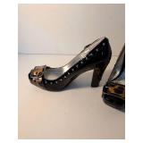 The Buckle Black Patent Leopard Trim Pumps