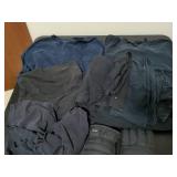 Two pairs of gloves and cut off sleeve shirts