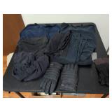 Two pairs of gloves and cut off sleeve shirts