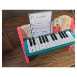 B. Toys Wooden Toy Piano for Toddlers, Coded Keys, Songbook   3+