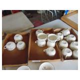 6 Saucers 14 cups or so