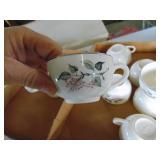 6 Saucers 14 cups or so