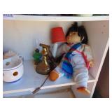 Contents of Shelf - Doll
